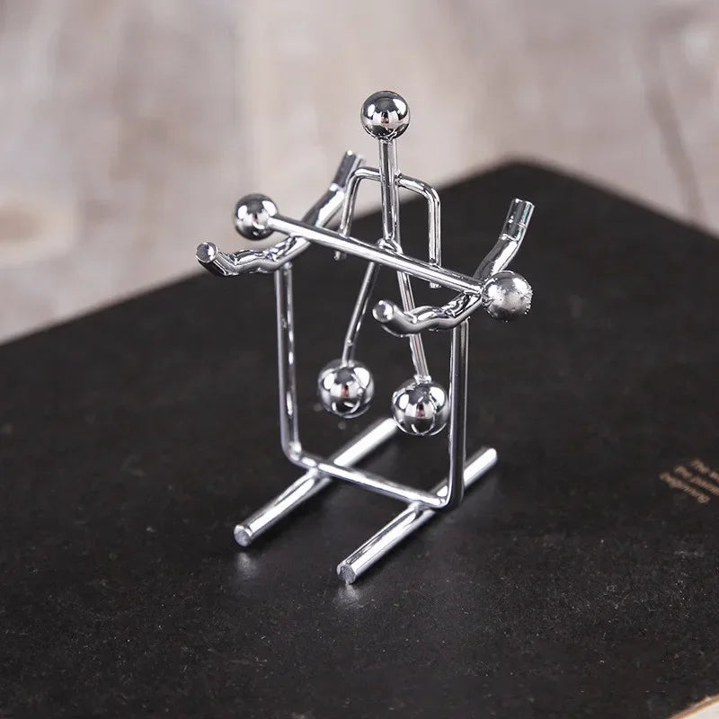 Balance Ball Newton Pendulum Ball Lelaki Iron Man Cradle Kreatif Imbangan Kraf Tumbler Mainan Meja Kanak-kanak Logam Dekorasi Rumah Accessorie