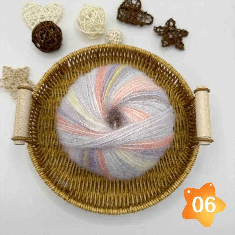 The yarn is a gradient wool-mohair blend with a rainbow segment-dyed medium weight. Each ball weighs 100 grams and is 350 meters