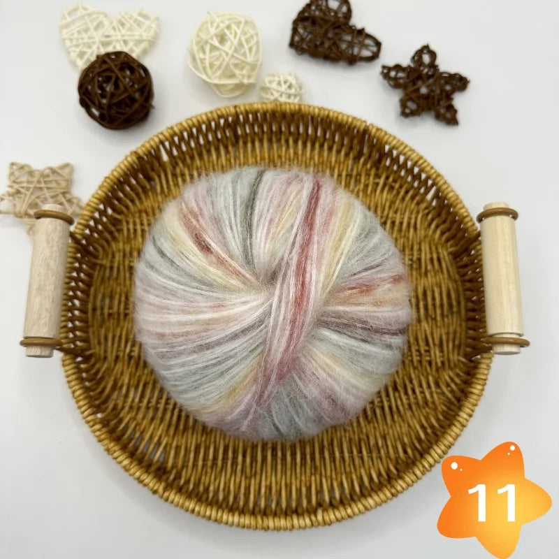 The yarn is a gradient wool-mohair blend with a rainbow segment-dyed medium weight. Each ball weighs 100 grams and is 350 meters