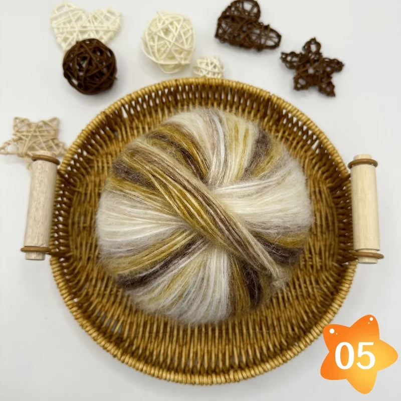 The yarn is a gradient wool-mohair blend with a rainbow segment-dyed medium weight. Each ball weighs 100 grams and is 350 meters