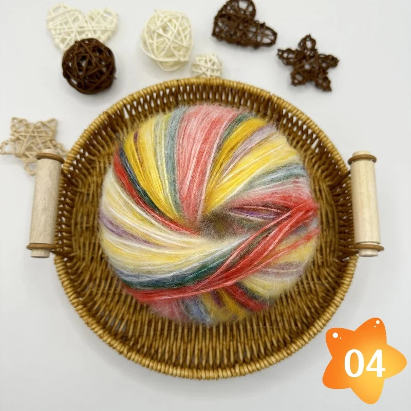The yarn is a gradient wool-mohair blend with a rainbow segment-dyed medium weight. Each ball weighs 100 grams and is 350 meters